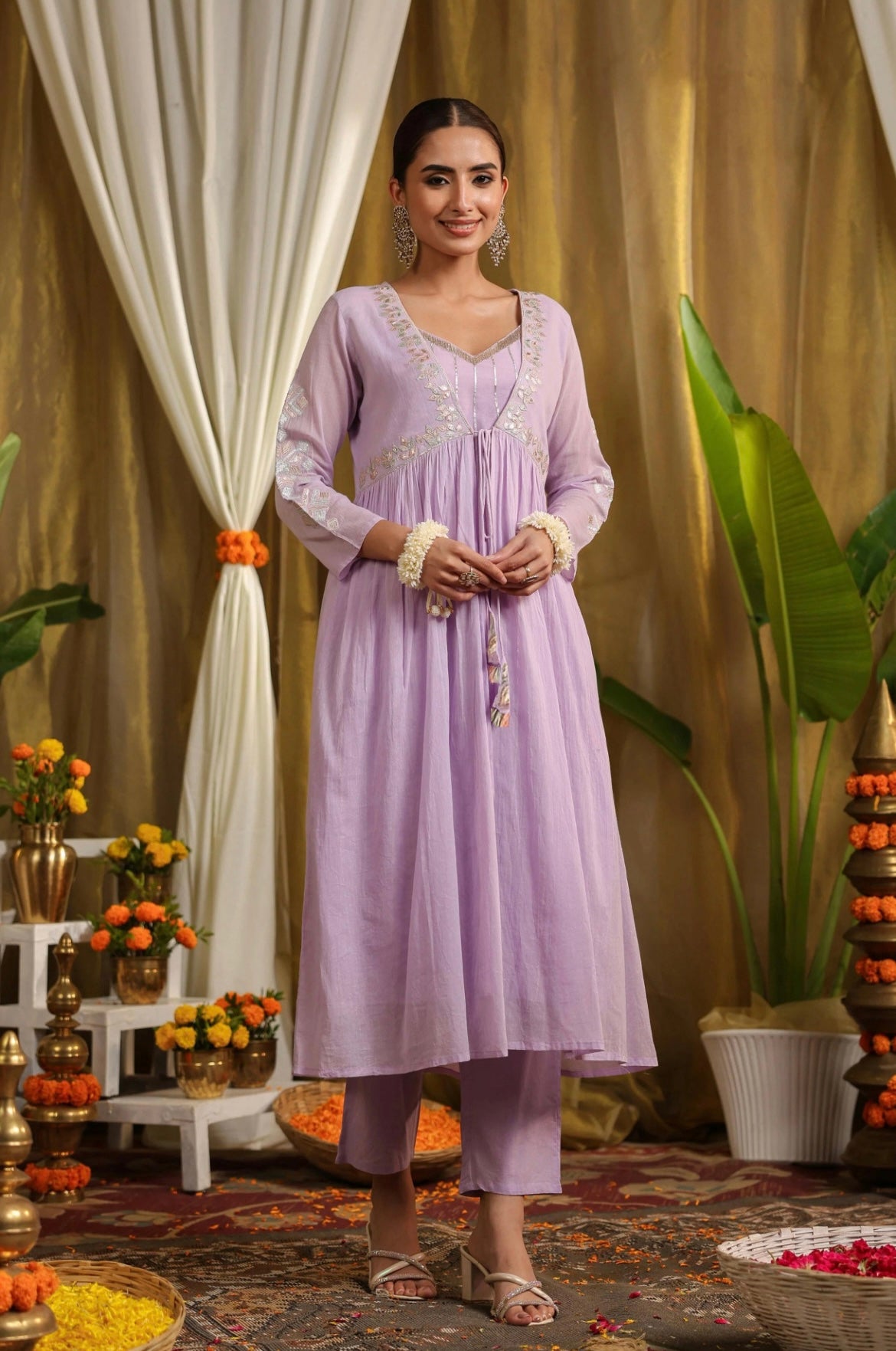 Indo western dress with shrug made in mulmul cotton embroidered with Gota work. Lavender colour with beautiful tassels. Full Front view
