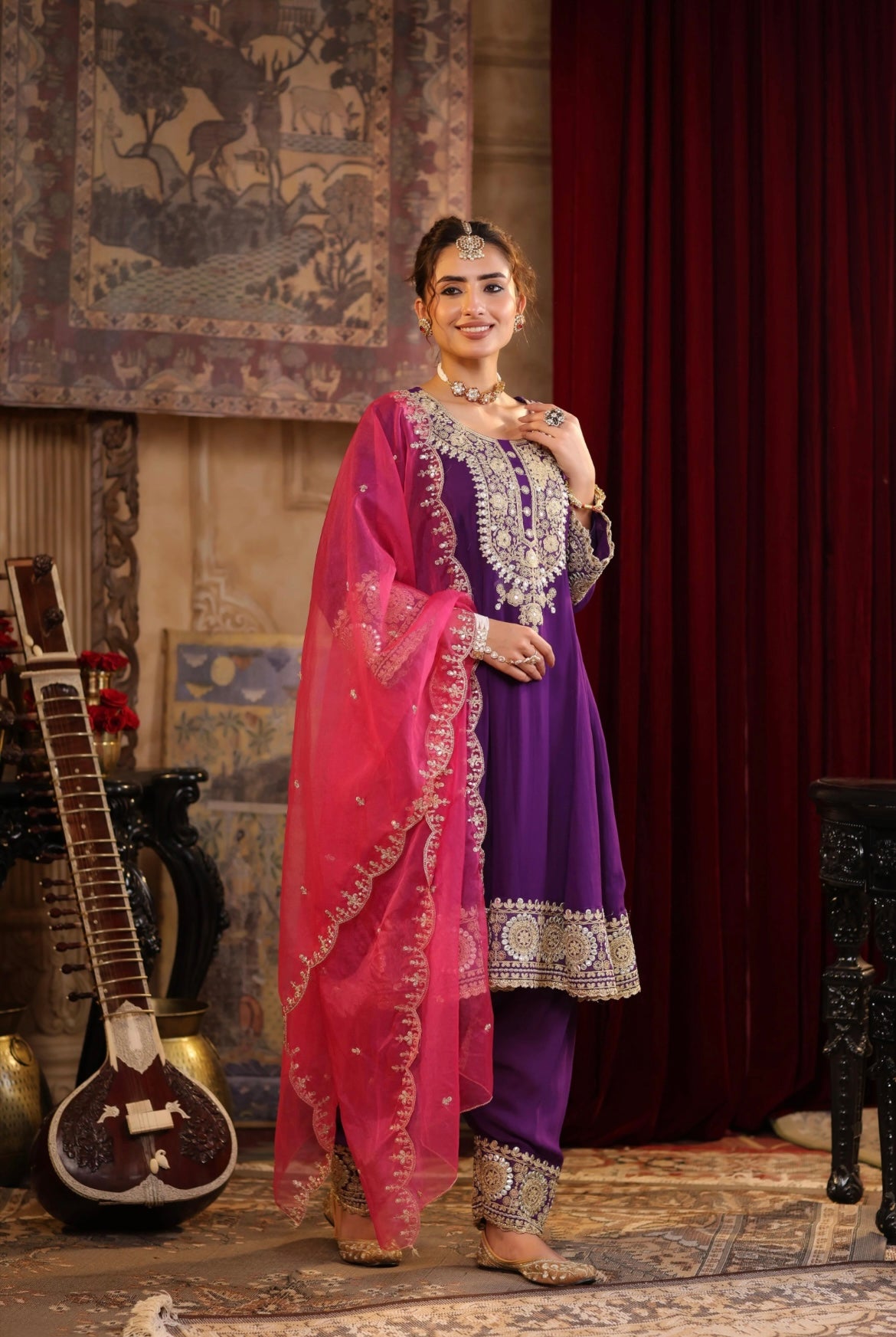Purple Anarkali Georgette Dori Gota Embroidery set with Fuchsia Pink Organza Dupatta. Side view.