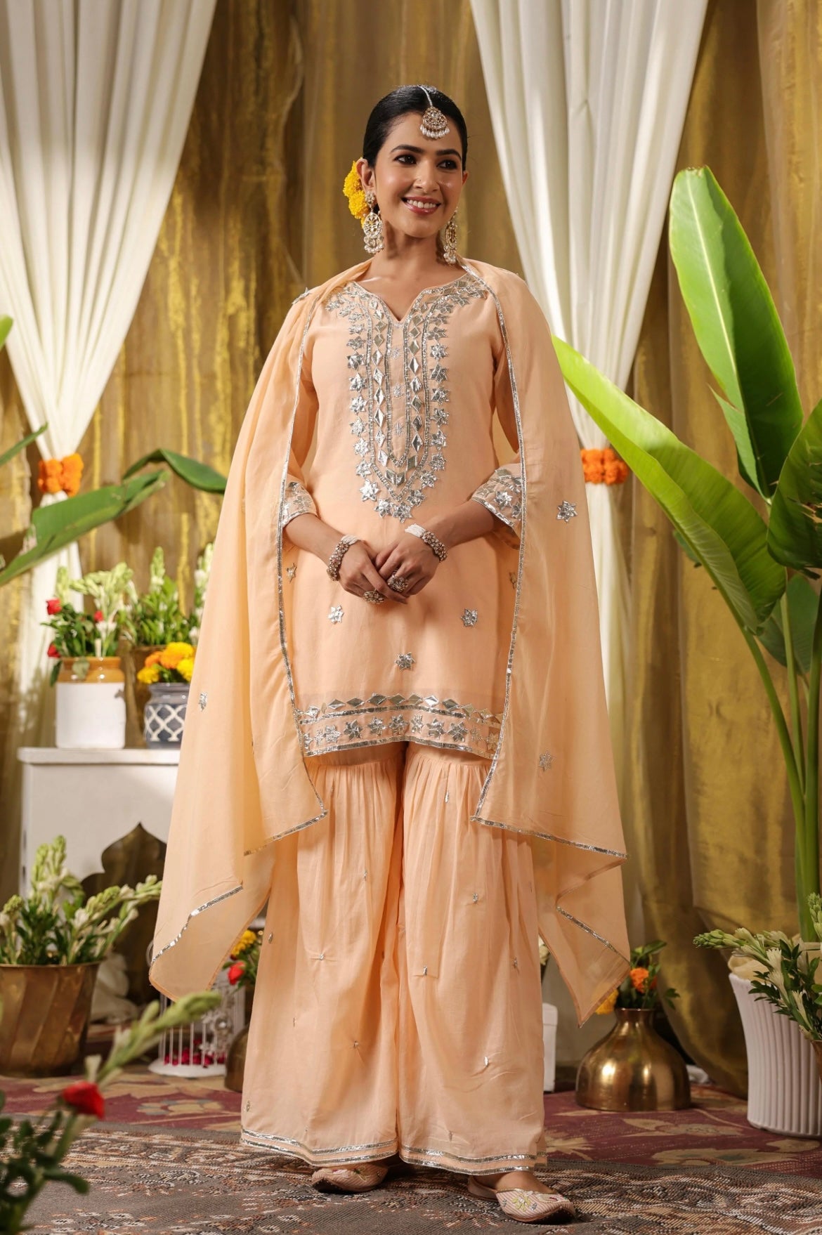 Cotton suit, cotton suit for women, women’s pant suits, peach colour, gota work, front full view.