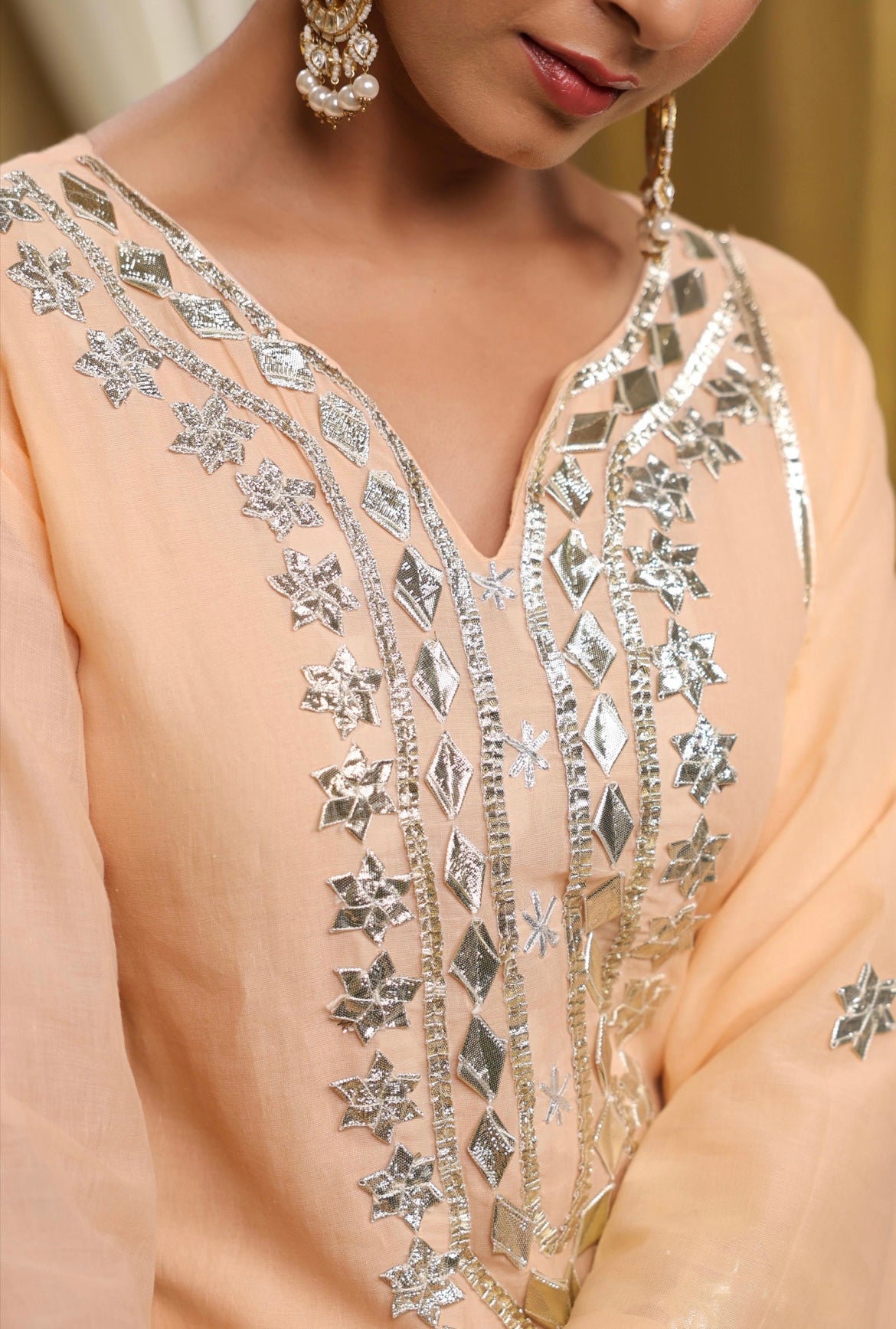 Cotton suit, mulmul suit, sharara suit, ladies cotton suit, pant suits for women, peach colour, gota work, zoomed image.