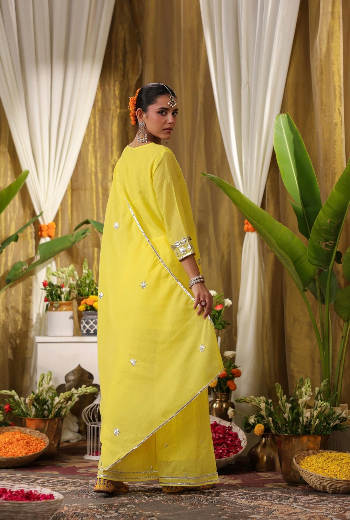 Cotton suit, ladies suit, mulmul suit, yellow colour, back view.