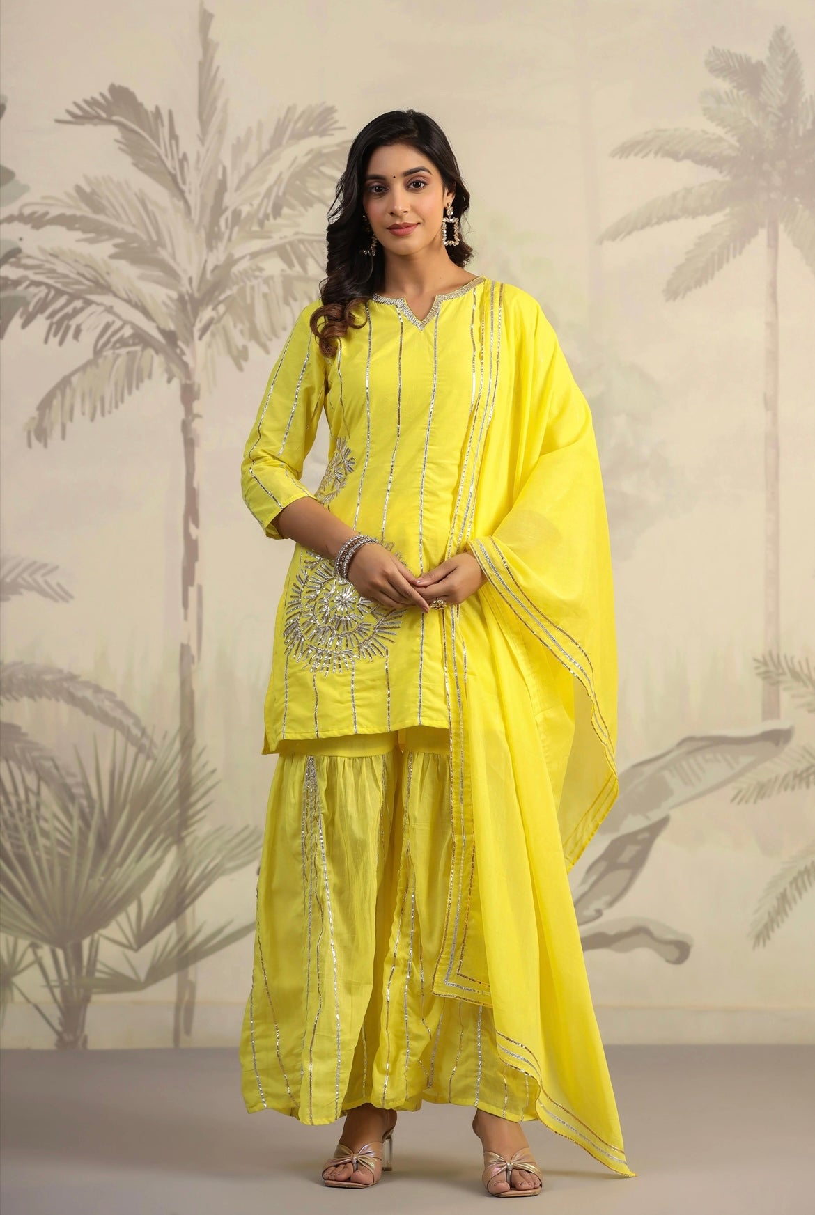 Women cotton kurta pant outfit, Gota work, Yellow colour, mulmul suit. Front Straight view.