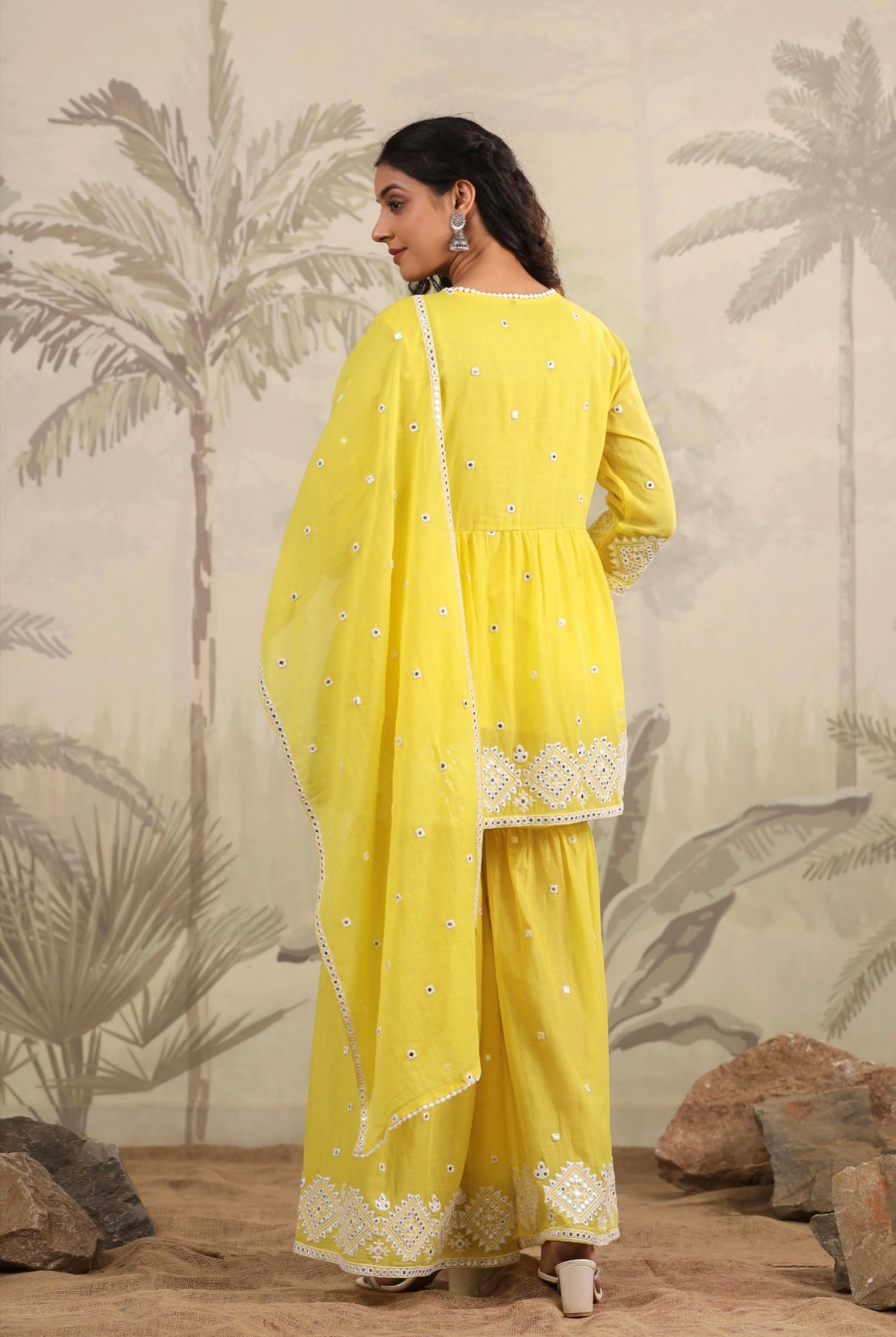 Sharara for woman, sharara, garara with peplum kurta. Yellow colour. Mirror work. Back view.