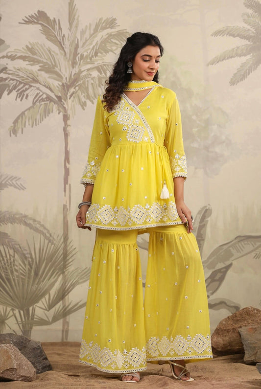 Sharara for woman, sharara, garara with peplum kurta. Yellow colour. Mirror work. Front view.