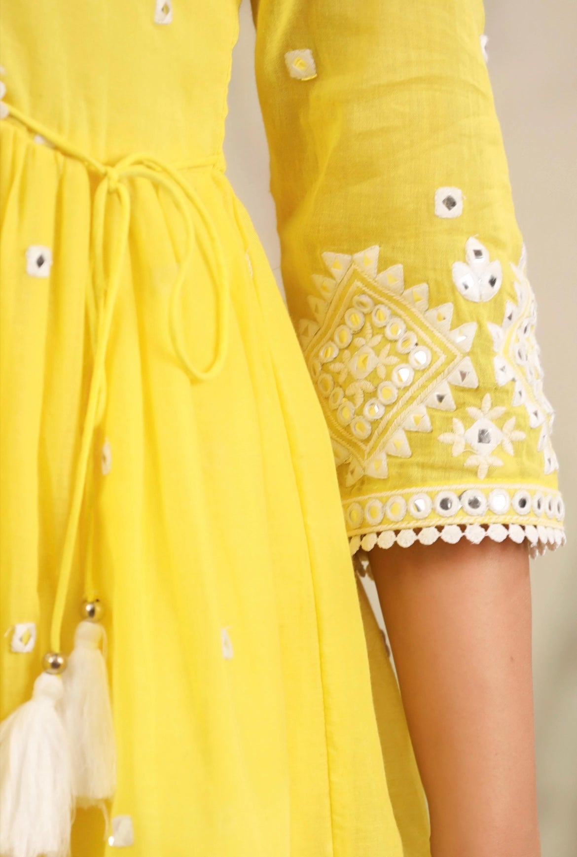 Sharara for woman, sharara, garara with peplum kurta. Yellow colour. Mirror work. Sleeve Detail view.