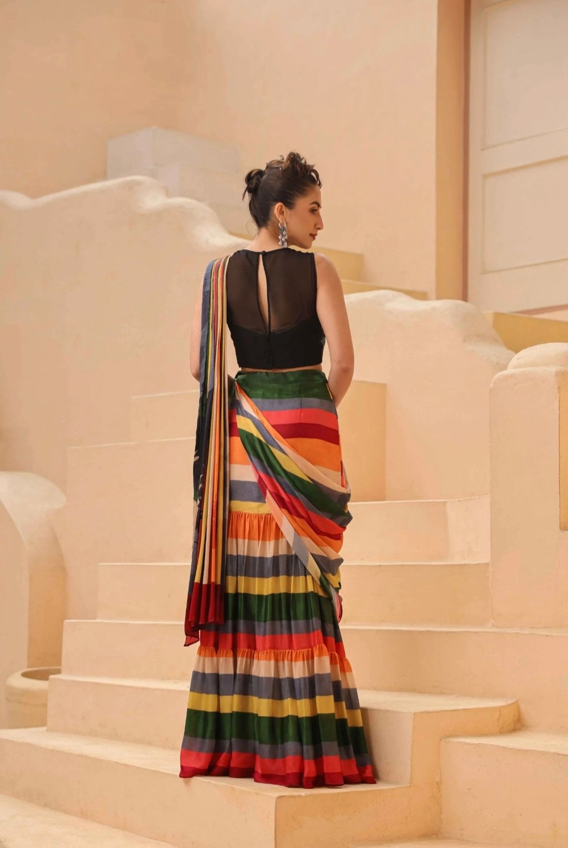 Drape saree, ready to wear. Made in luxurious satin georgette and organza fabric. Multicolour printed with hand embroidery blouse. Back View.