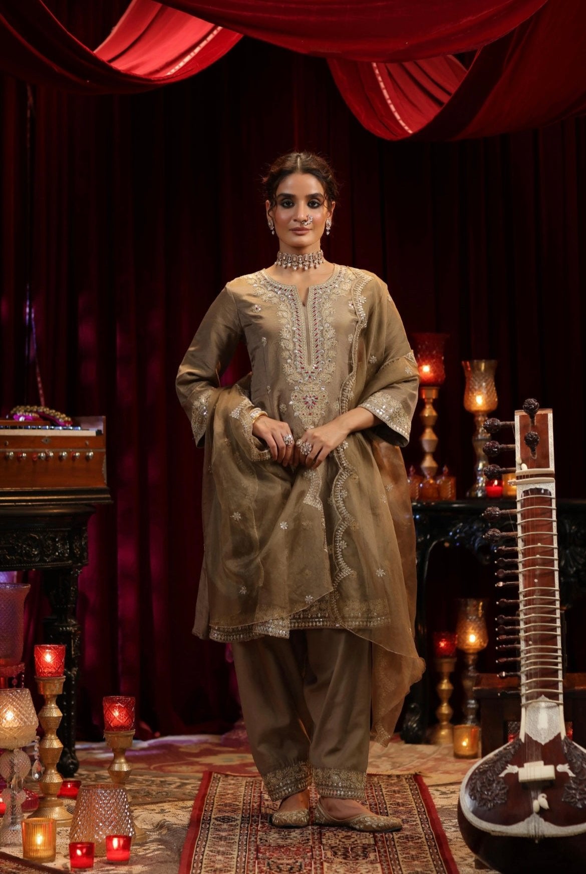 Brown Shimmer Organza Anarkali Salwar et. Zari dori work with thread embroidery. Organza Dupatta. Front view.