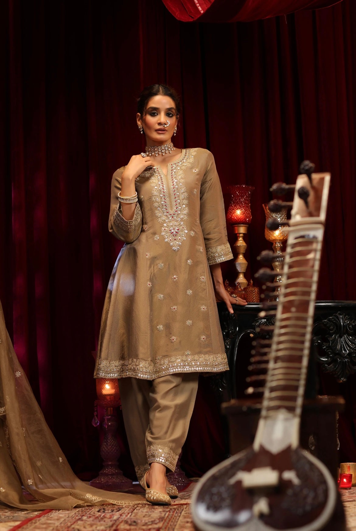 Brown Shimmer Organza Anarkali Salwar et. Zari dori work with thread embroidery. Organza Dupatta. Front view.