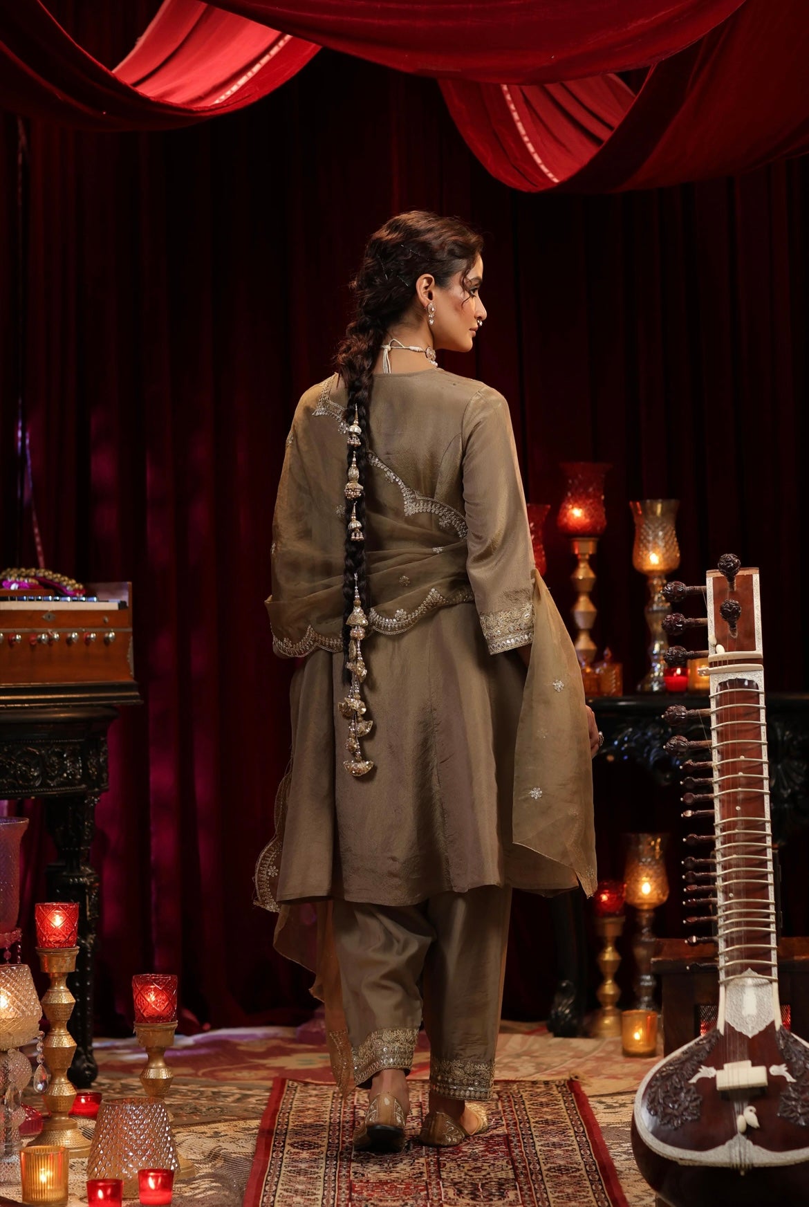 Brown Shimmer Organza Anarkali Salwar et. Zari dori work with thread embroidery. Organza Dupatta. Back view.