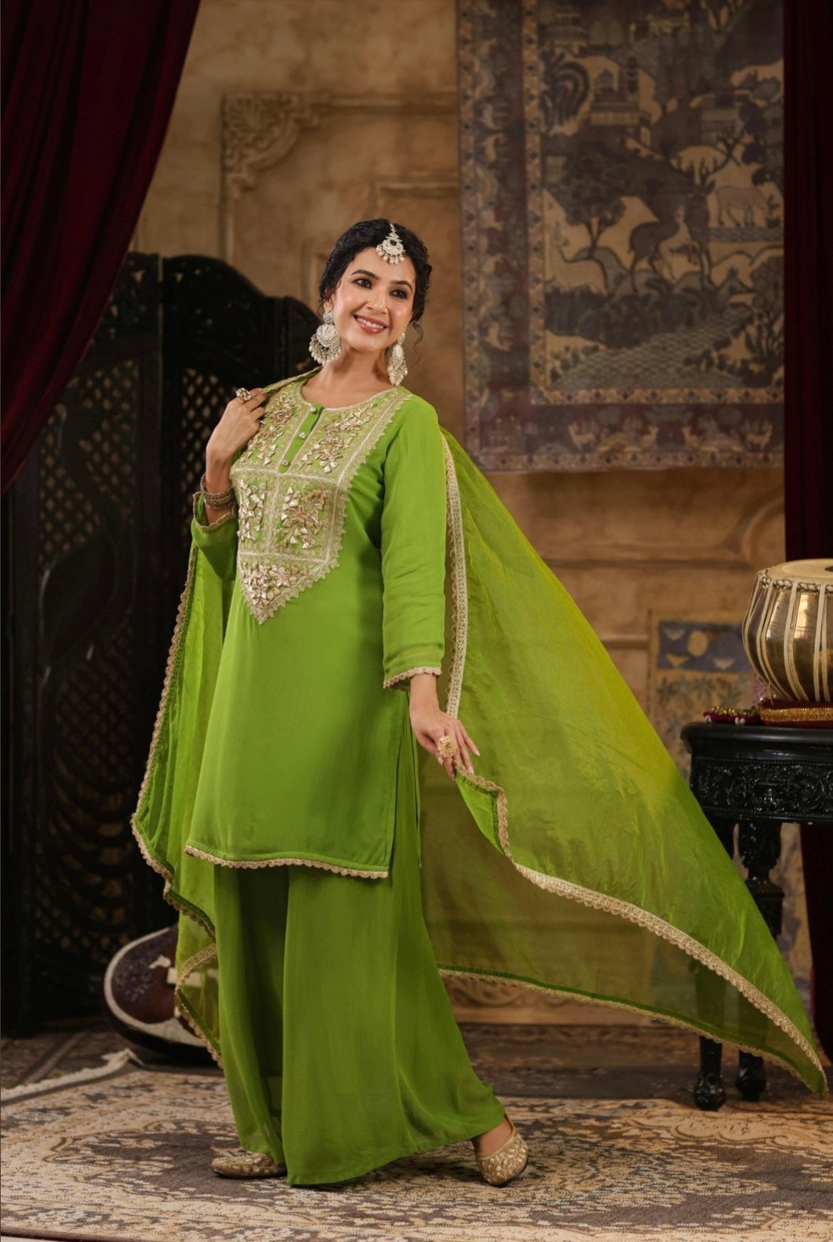 Green Georgette Kurta Palazzo Set with Gota and Dori embroidery. Side View.