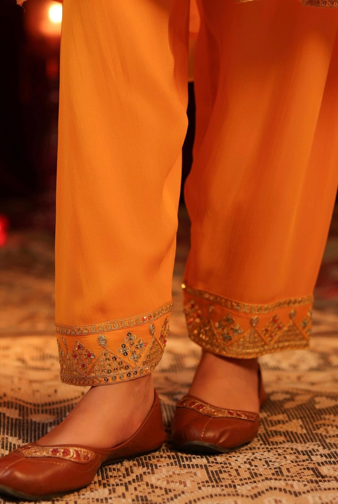 Yellow Georgette Anarkali Salwar set adorned with sequin, thread, dori and zari work. Salwar Detail view