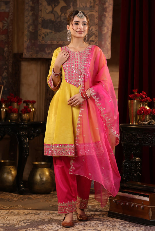 Lime Anarkali with Fuchsia Salwar set adorned with Dori and Gota embroidery. Front View.