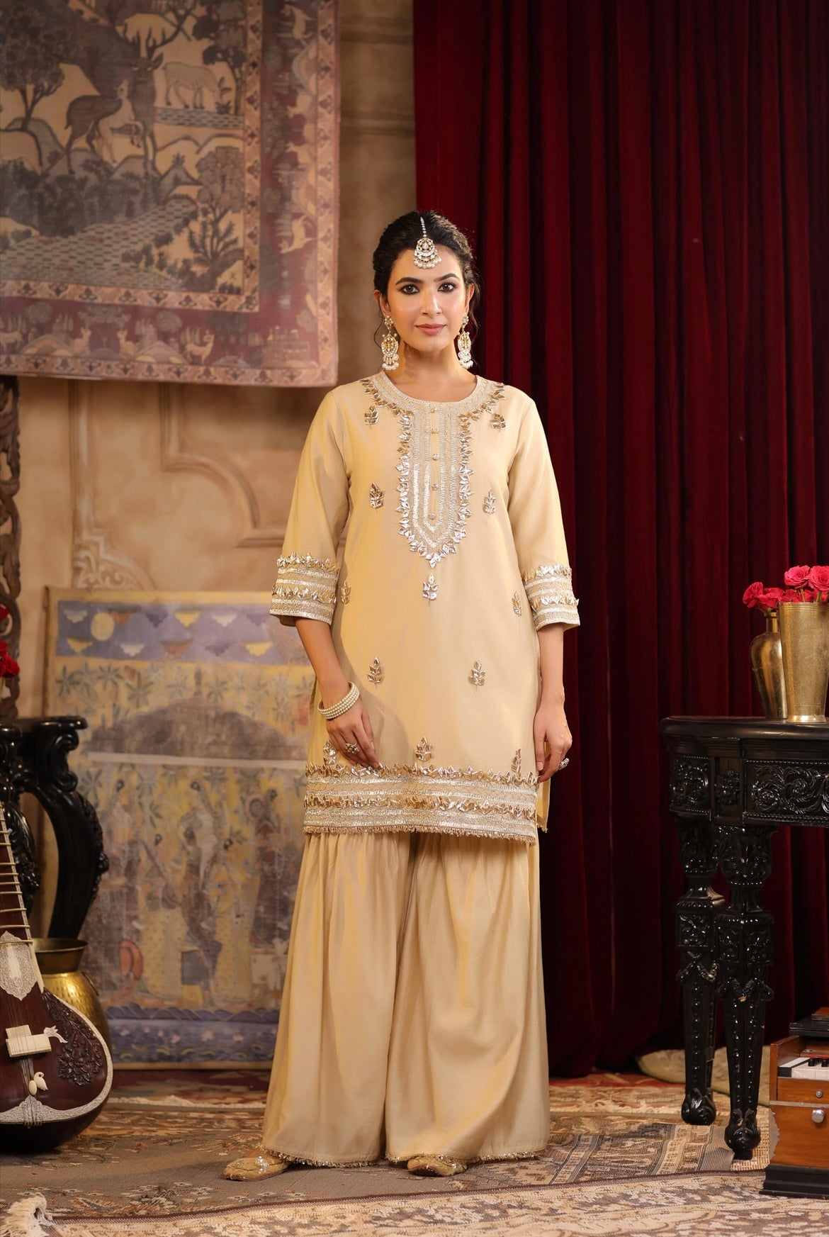 Beige Chanderi Silk Kurta Sharara Set with gota and Dori embroidery. Front view.