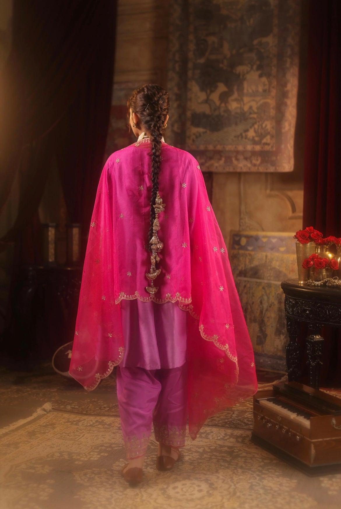 Mauve Fuchsia Anarkali Salwar Silk Set embroidered in zari and dori. Back view.