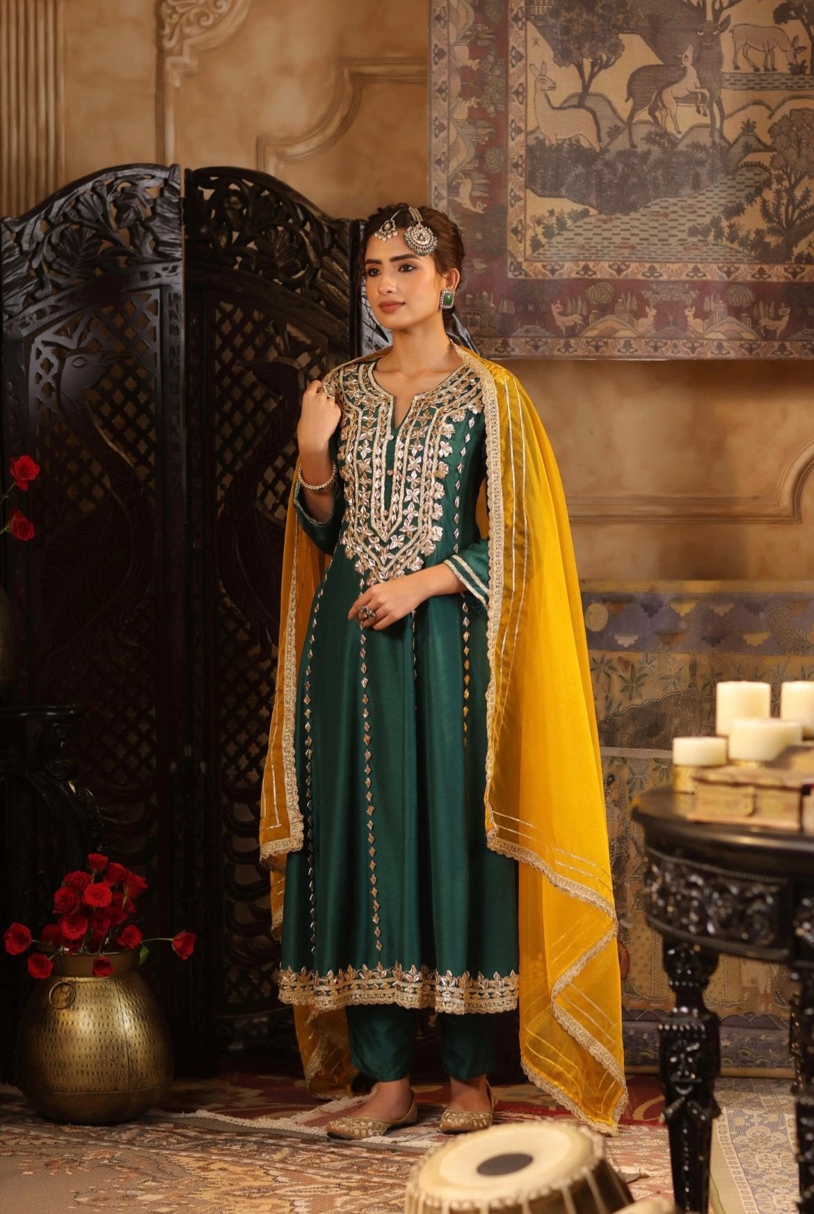 Dark Green Silk Anarkali with Pants. Gota Patti Embroidery. Side view.