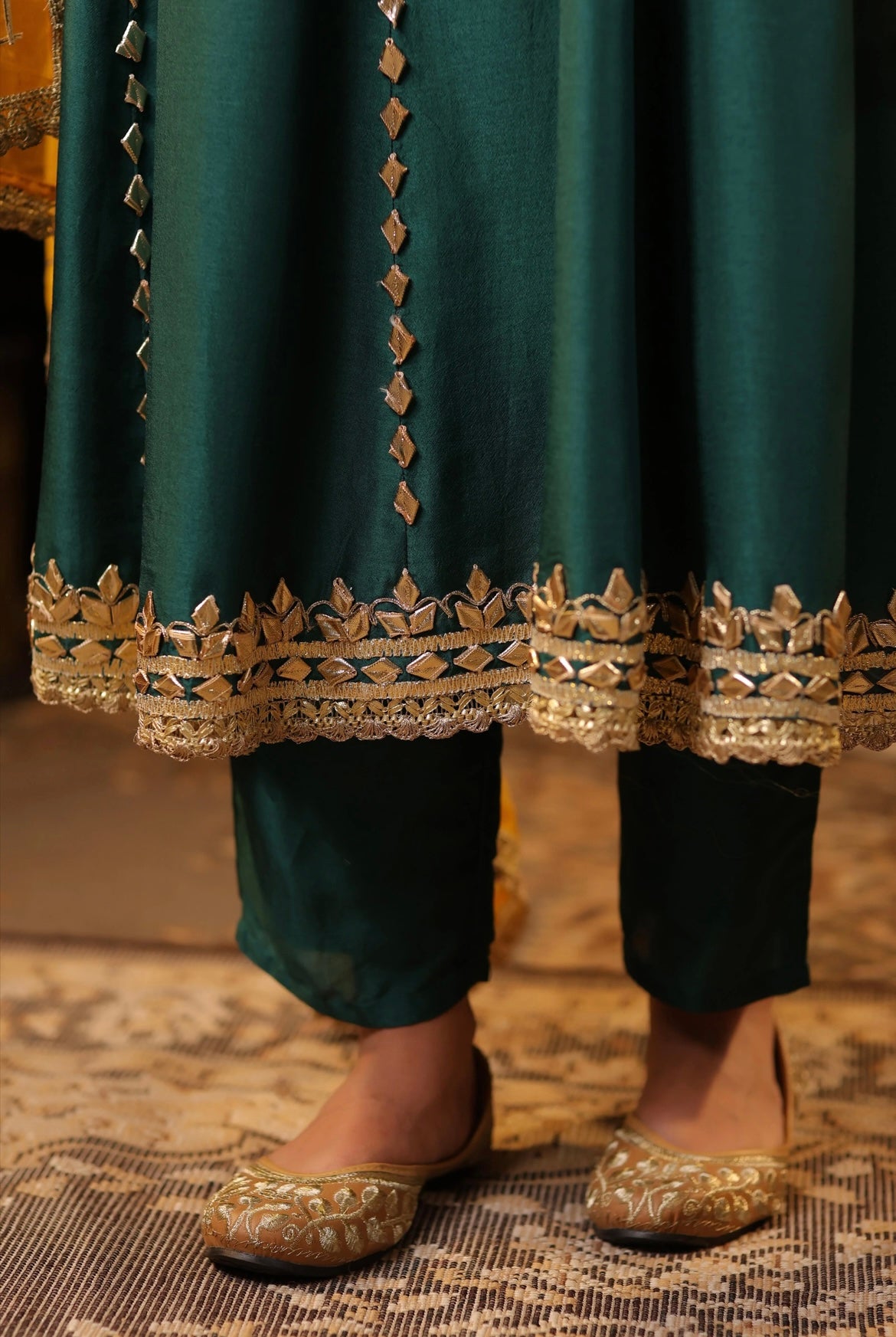 Dark Green Silk Anarkali with Pants. Gota Patti Embroidery. Bottom Detail view.