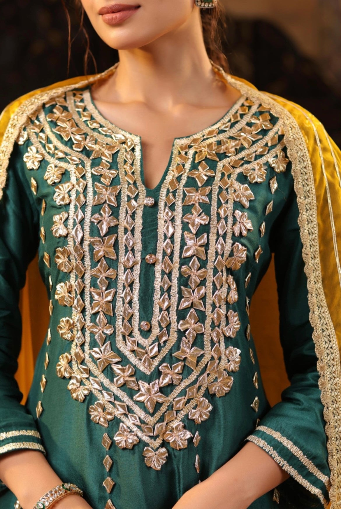 Dark Green Silk Anarkali with Pants. Gota Patti Embroidery. Detail view.