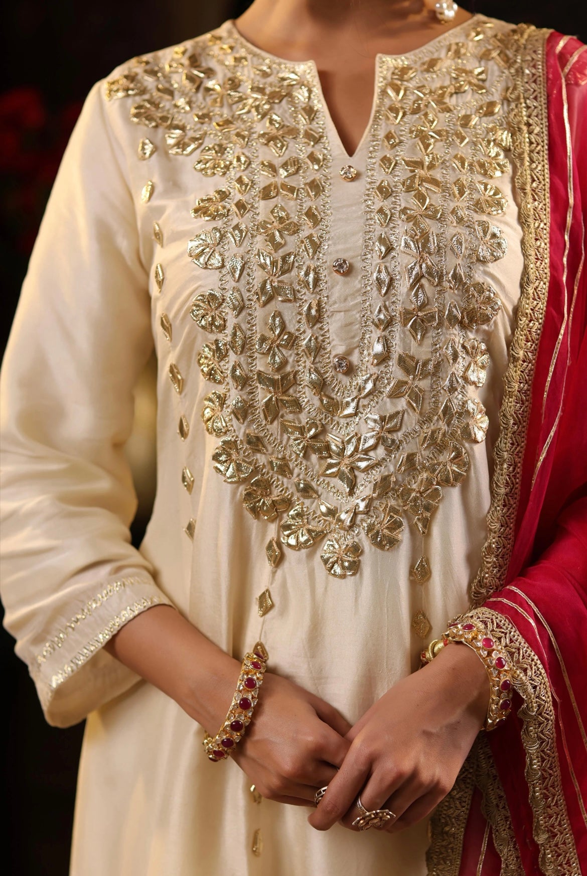 Ivory Fuchsia Silk Anarkali Set with Gota Work. Detail view.