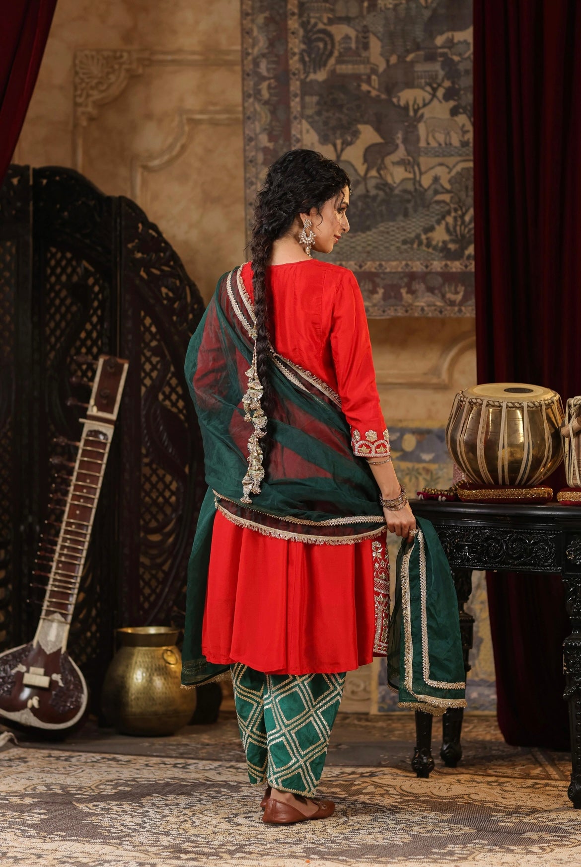 Red and Dark Green Silk Anarkali Salwar Set with Gota embroidery. Back view.