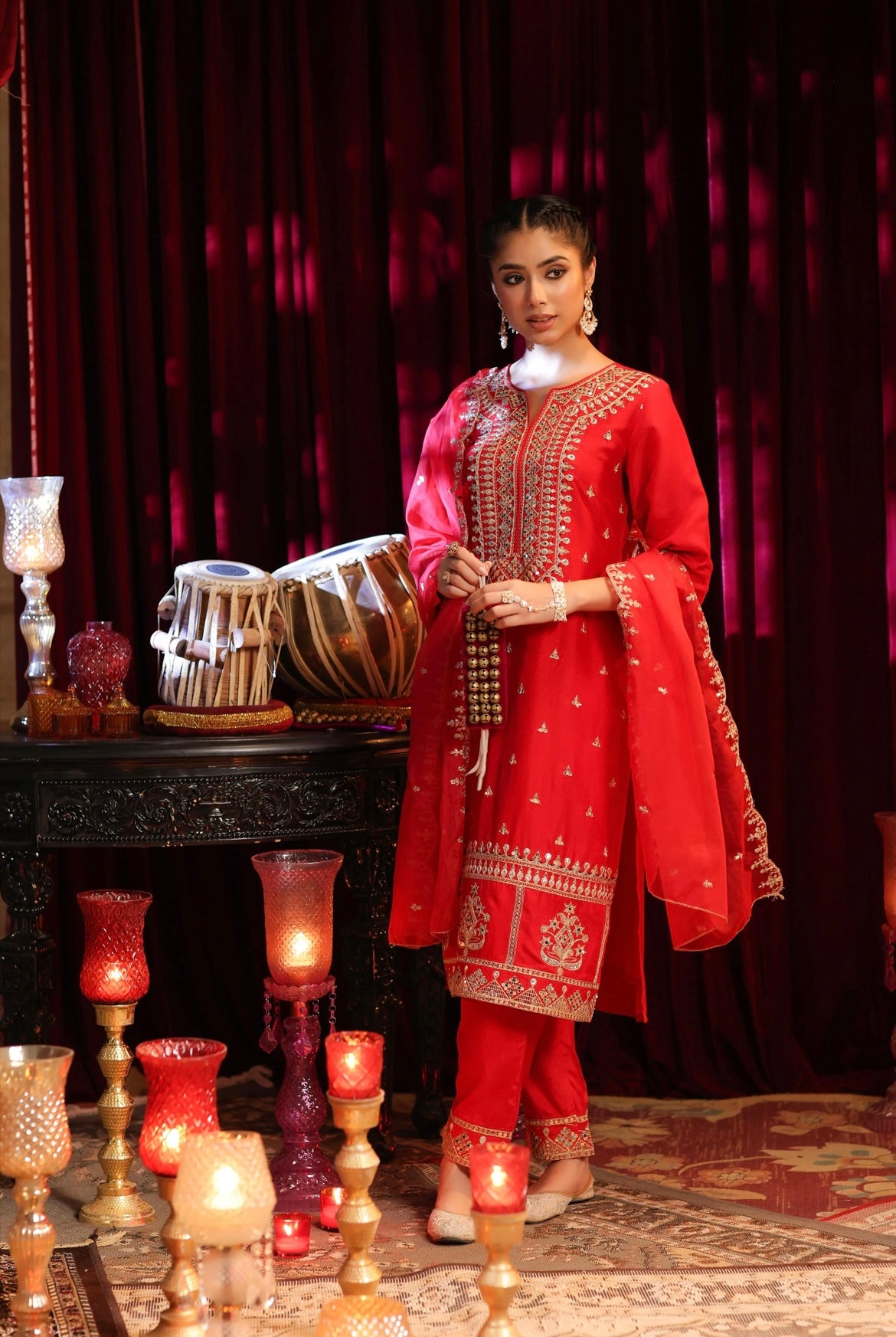 Red Silk Kurta Pant set with dori sequin embroidery. Side view.