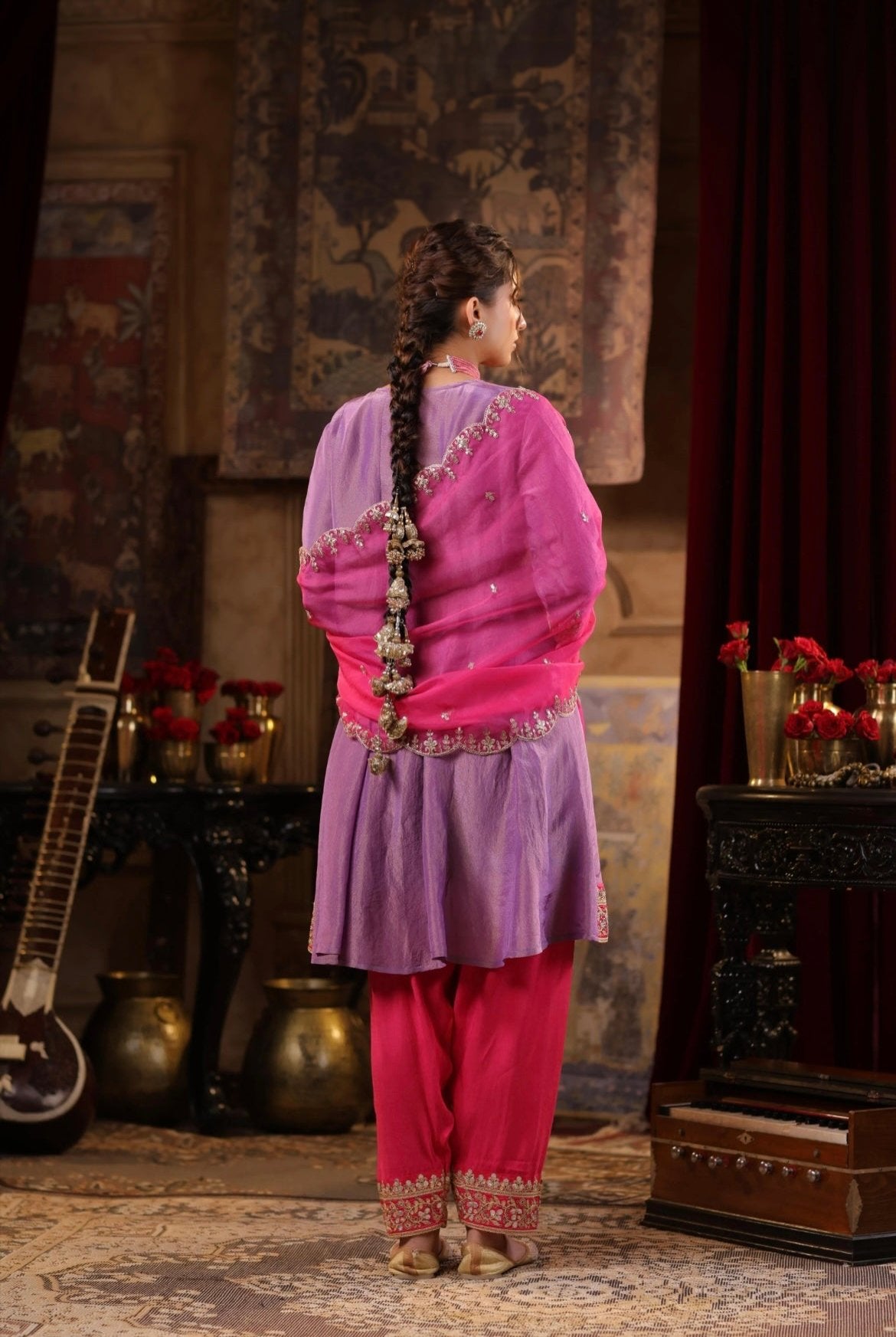 Purple Shimmer Organza Anarkali with Fuchsia Salwar and Dupatta. Dori and Zari work. Back view.