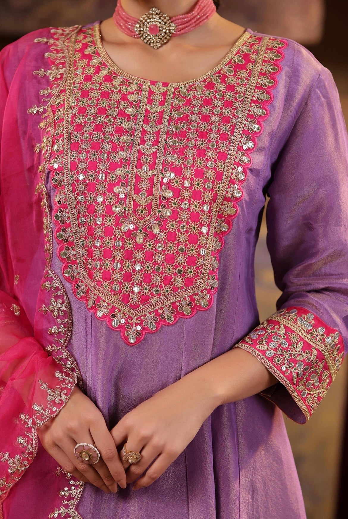 Purple Shimmer Organza Anarkali with Fuchsia Salwar and Dupatta. Dori and Zari work. Detail view.