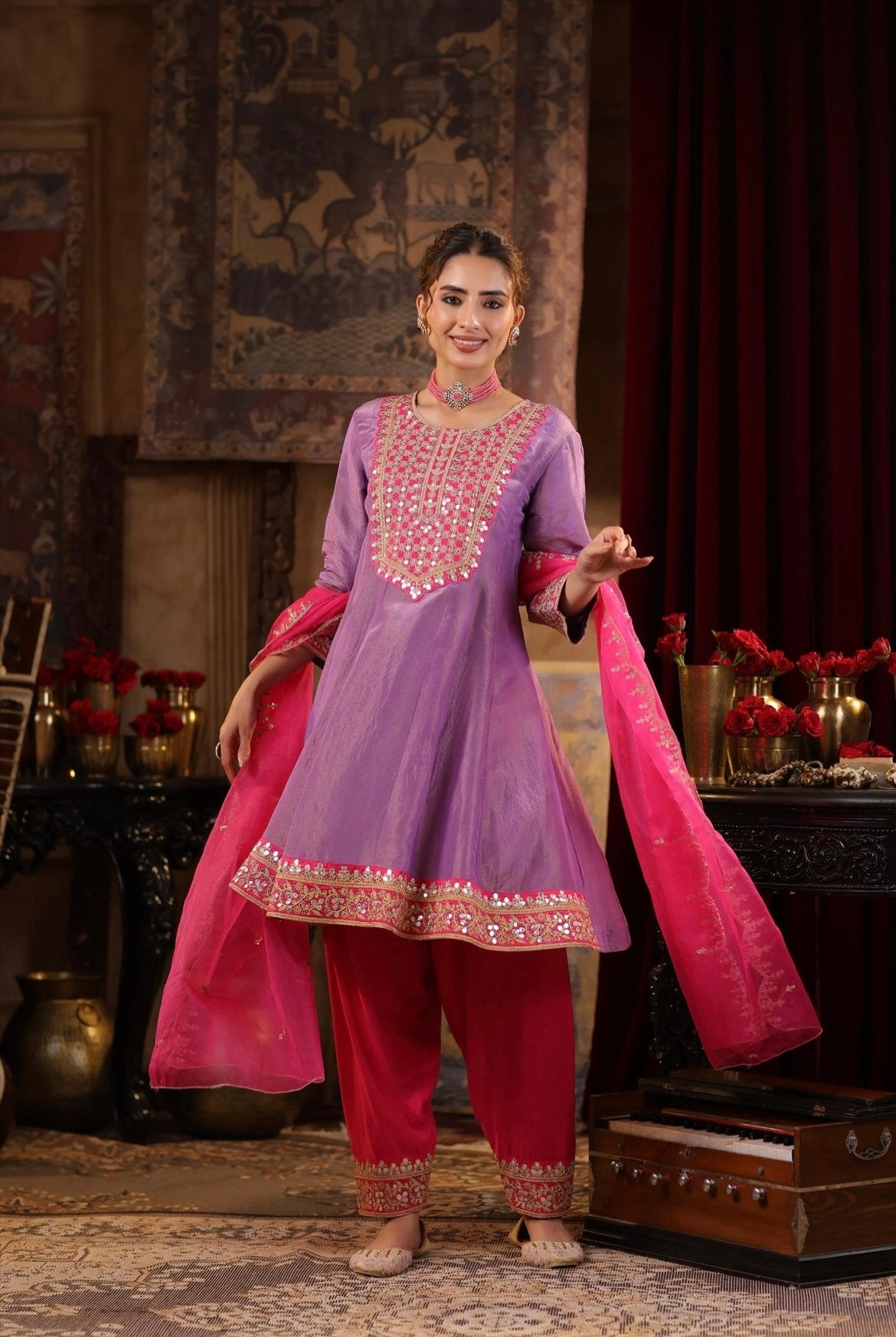 Purple Shimmer Organza Anarkali with Fuchsia Salwar and Dupatta. Dori and Zari work. Twirl view