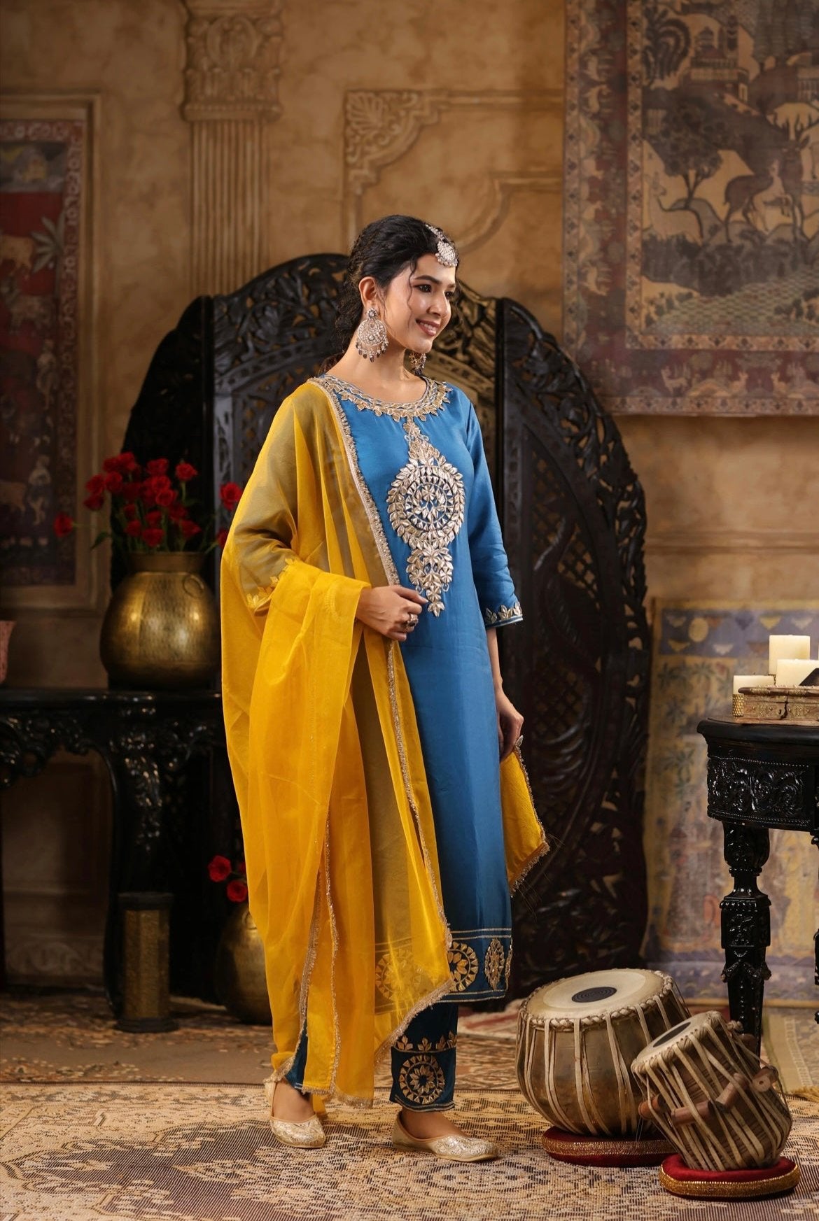 Teal Blue Silk Kurta with Mustard Organza Dupatta Set. Gota Patti embroidery. Side view.