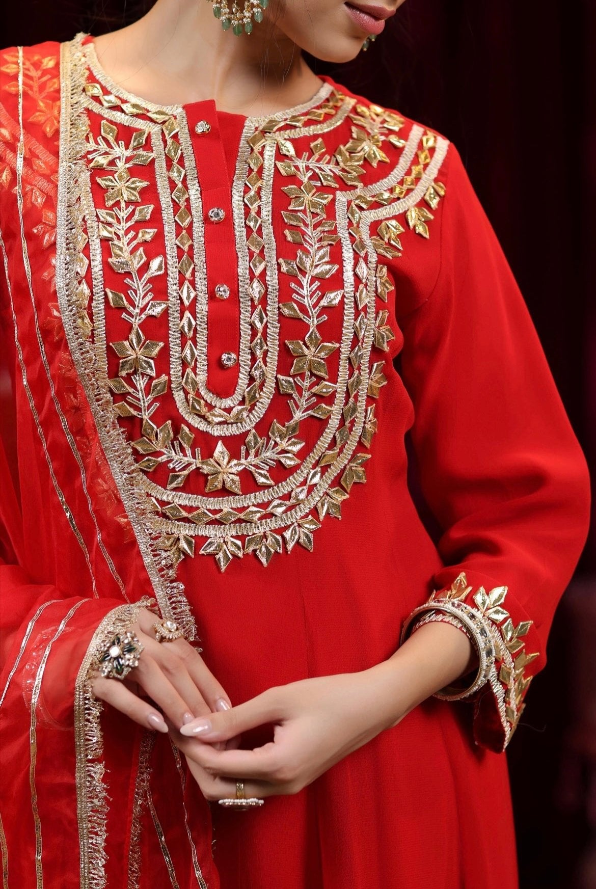 Red Georgette Anarkali and Salwar with Gota atti Embroidery. Organza Dupatta. Detail view.